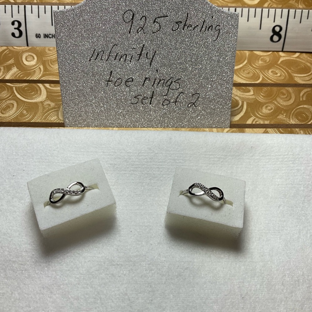 Infinity toe rings marked 925 cuz